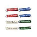 Schlüsselschilder Filz, 4 Farben + 8 Sprüche, 14x3cm, 100er Display